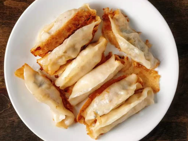 Crispy-bottomed dumplings with savory fillings at Village Bao 又一村包子，a Chinese Restaurant in Sugar Land